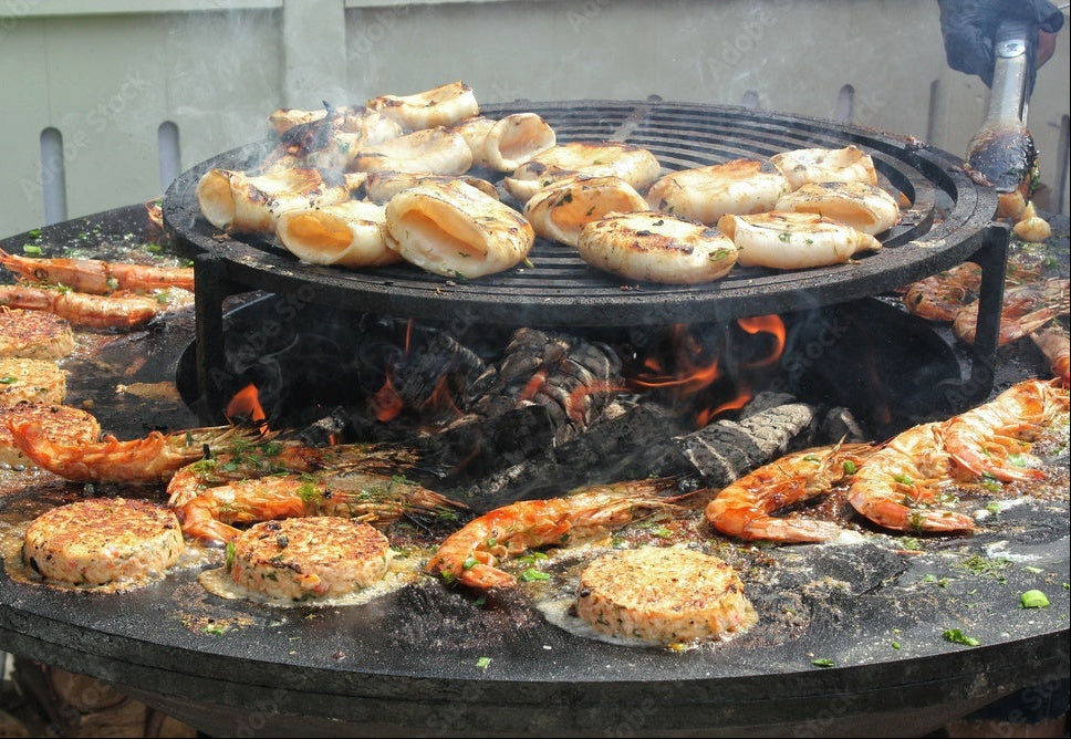 Adobe stock outdoor cooking open fire seafood shrimp prawns calamari grilling